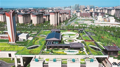 雄安新区1+5+X剧村城市智慧能源融合站与周边城市风貌融为一体。   孙梅丹摄